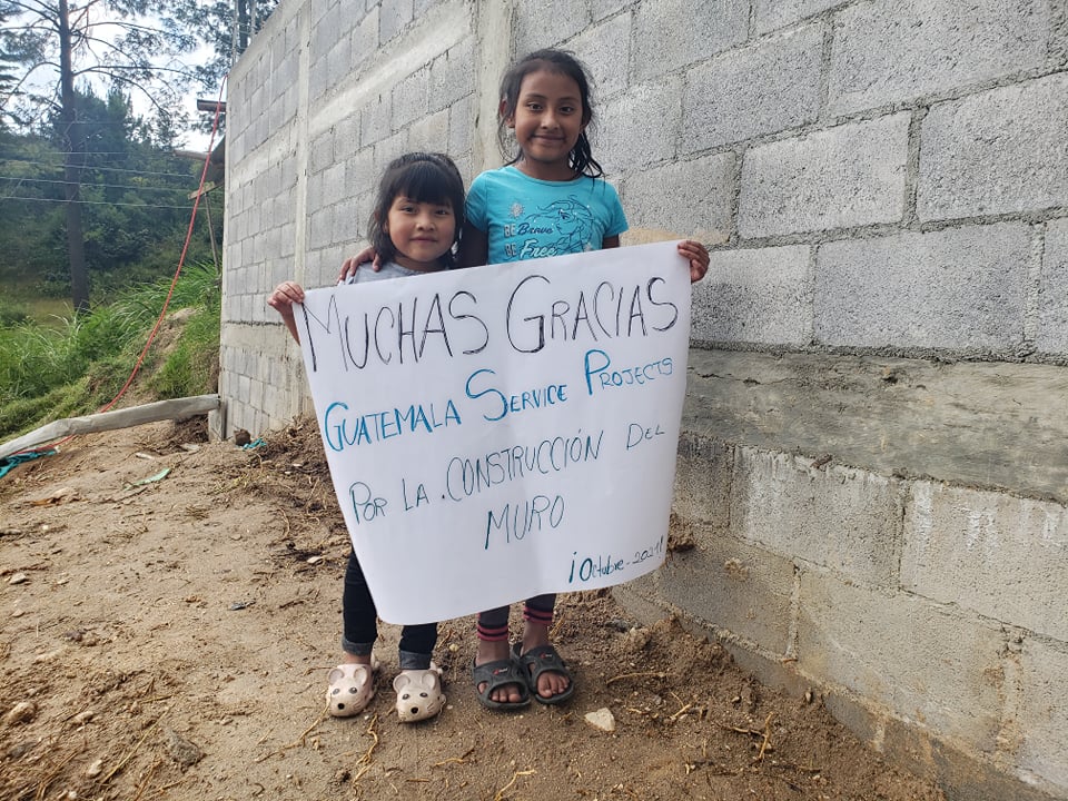 These girls and their parents were thankful that we saved their home and protected the neighbors that lived below them when the mudslide happened.